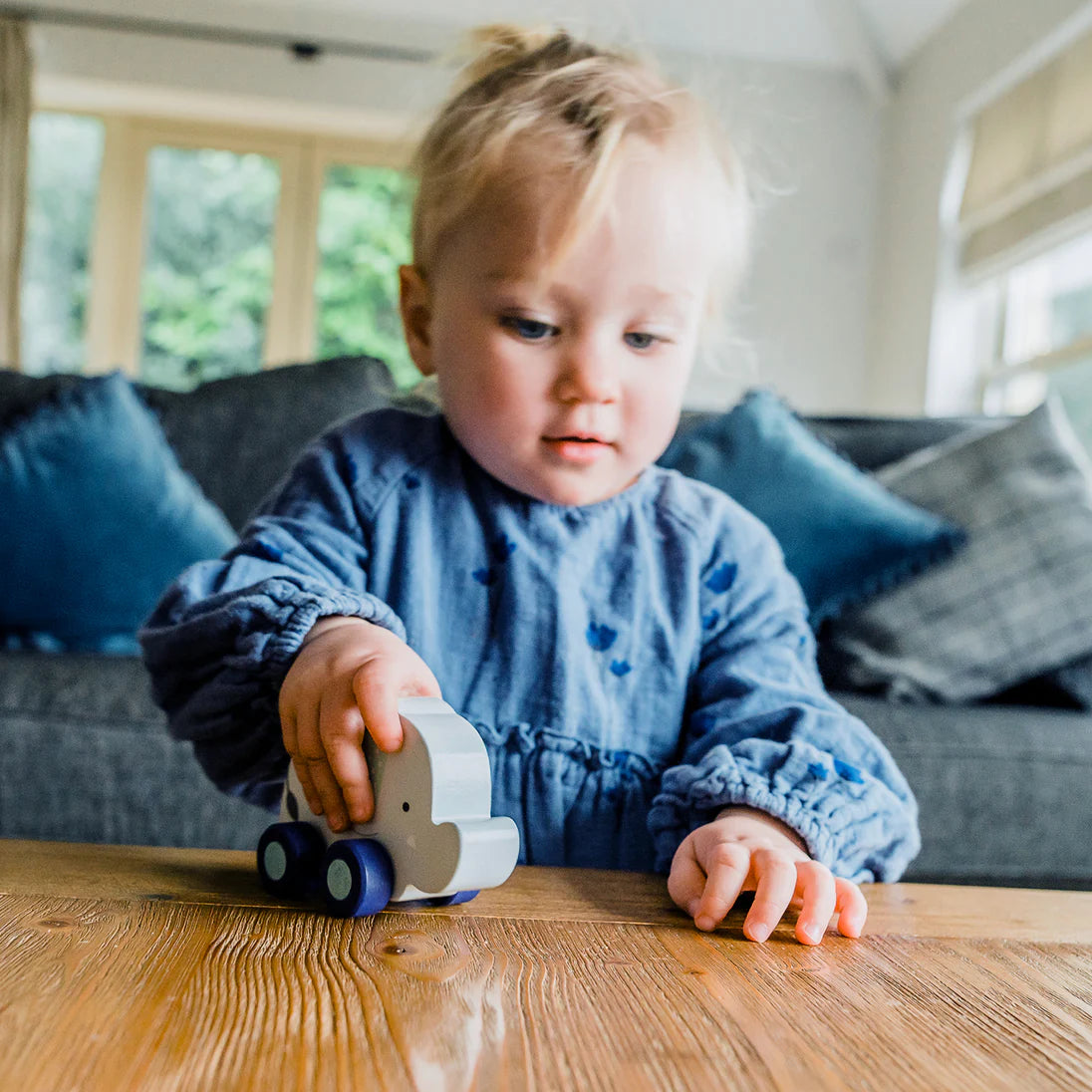 Wooden push along elephant toy made from FSC® sustainable wood, eco-friendly and safe for toddlers aged 18m+, smooth and durable design