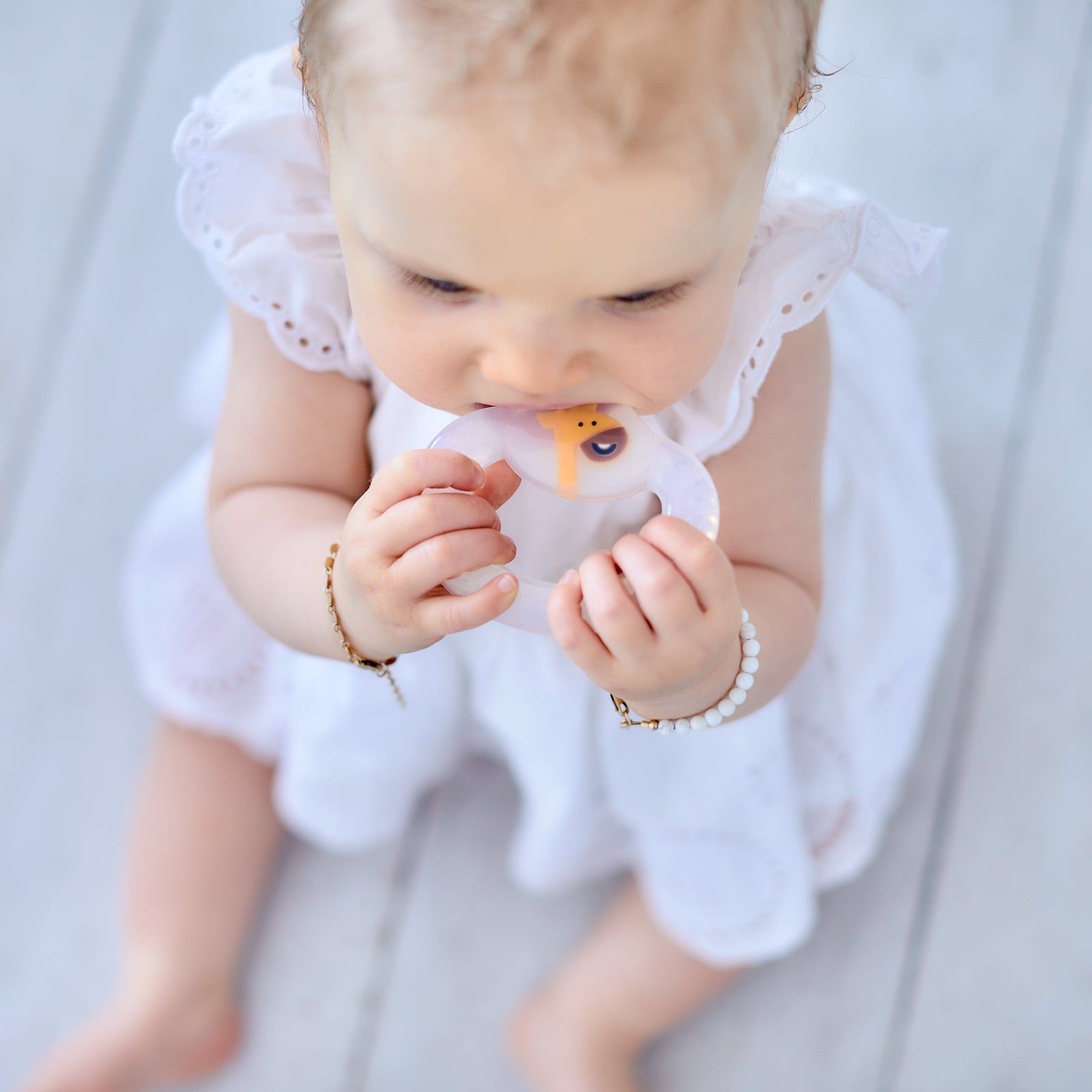 Marcus & Marcus Baby Teething Toothbrush in yellow Giraffe design, BPA-free silicone toothbrush with soft bristles for tender gums