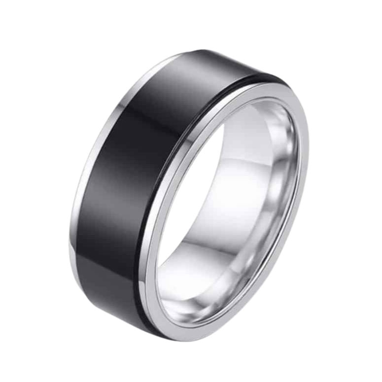 The Men’s Black & Silver Spinner Ring – Sleek Stress Relief Band features a polished black exterior with silver edges, blending modern style and subtle anxiety relief. Ideal for daily wear, shown on a white background.
